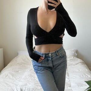 Black long sleeve crop top with cut out detail